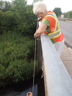 River Guardian Vicky Parker, sampling on the Annapolis River.: Photograph courtesy of Clean Annapolis River Project